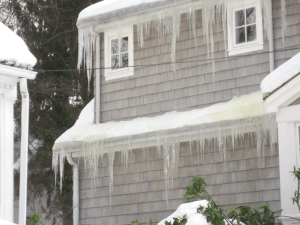 Icicles on Gray House